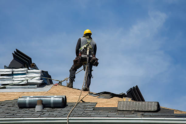 Professional Roof Replacement technician working in Kinsman, OH